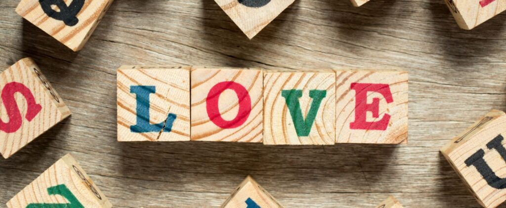 The word 'love' spelt out on wooden blocks